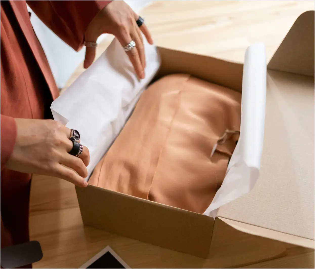 A luxury bag wrapped on paper